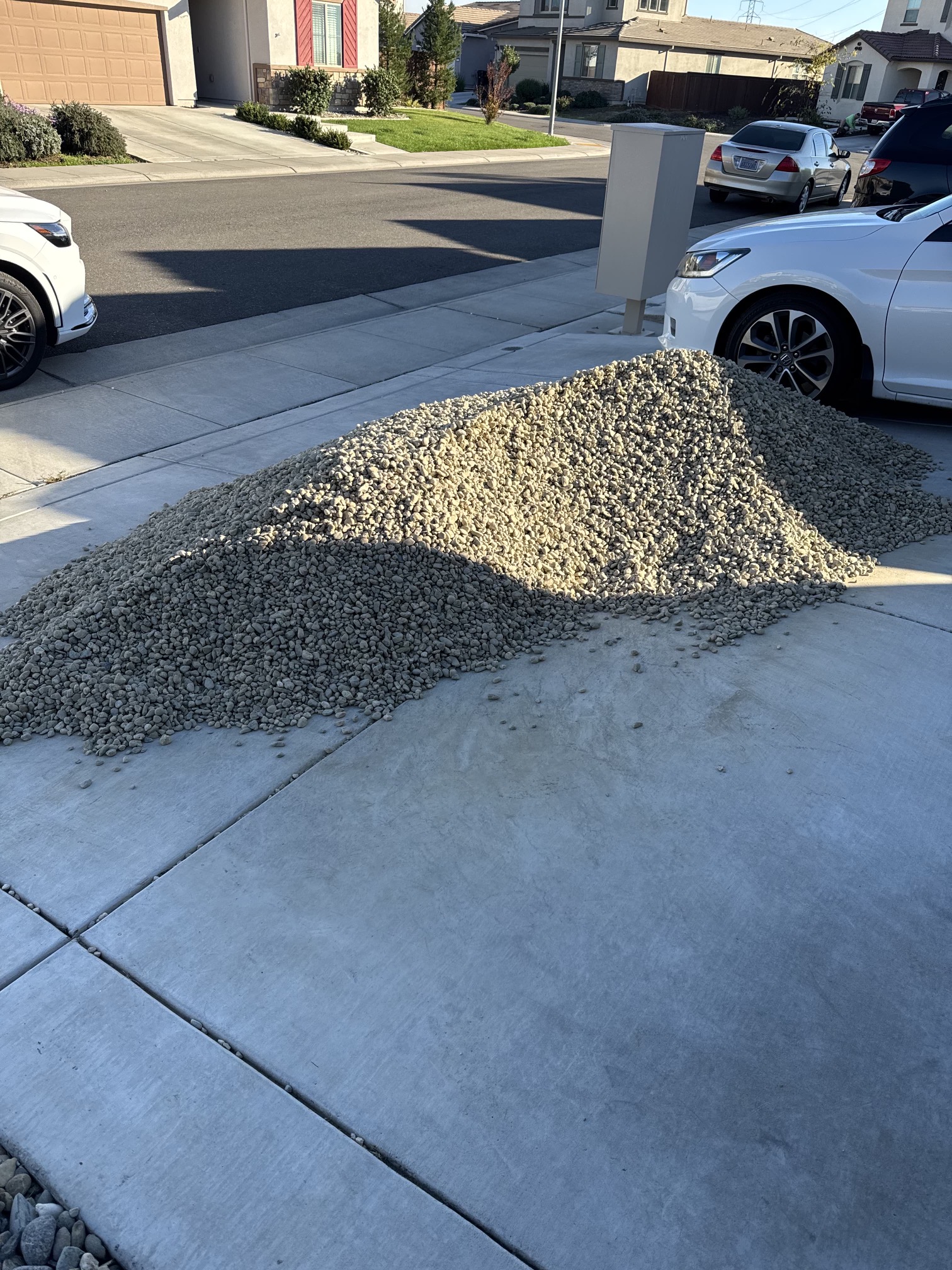 Before - Large pile of gravel in driveway